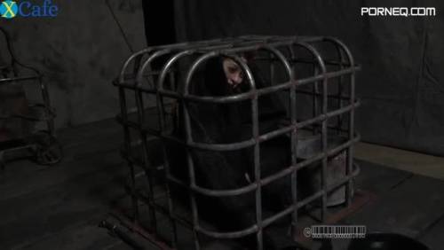 Ruined red haired MILF gets locked in metal cage showing off her tits - new.porneq.com on delporno.com